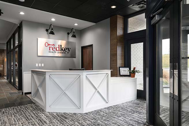 realtor at desk